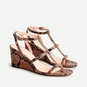 T-strap wedges in snake-embossed leather